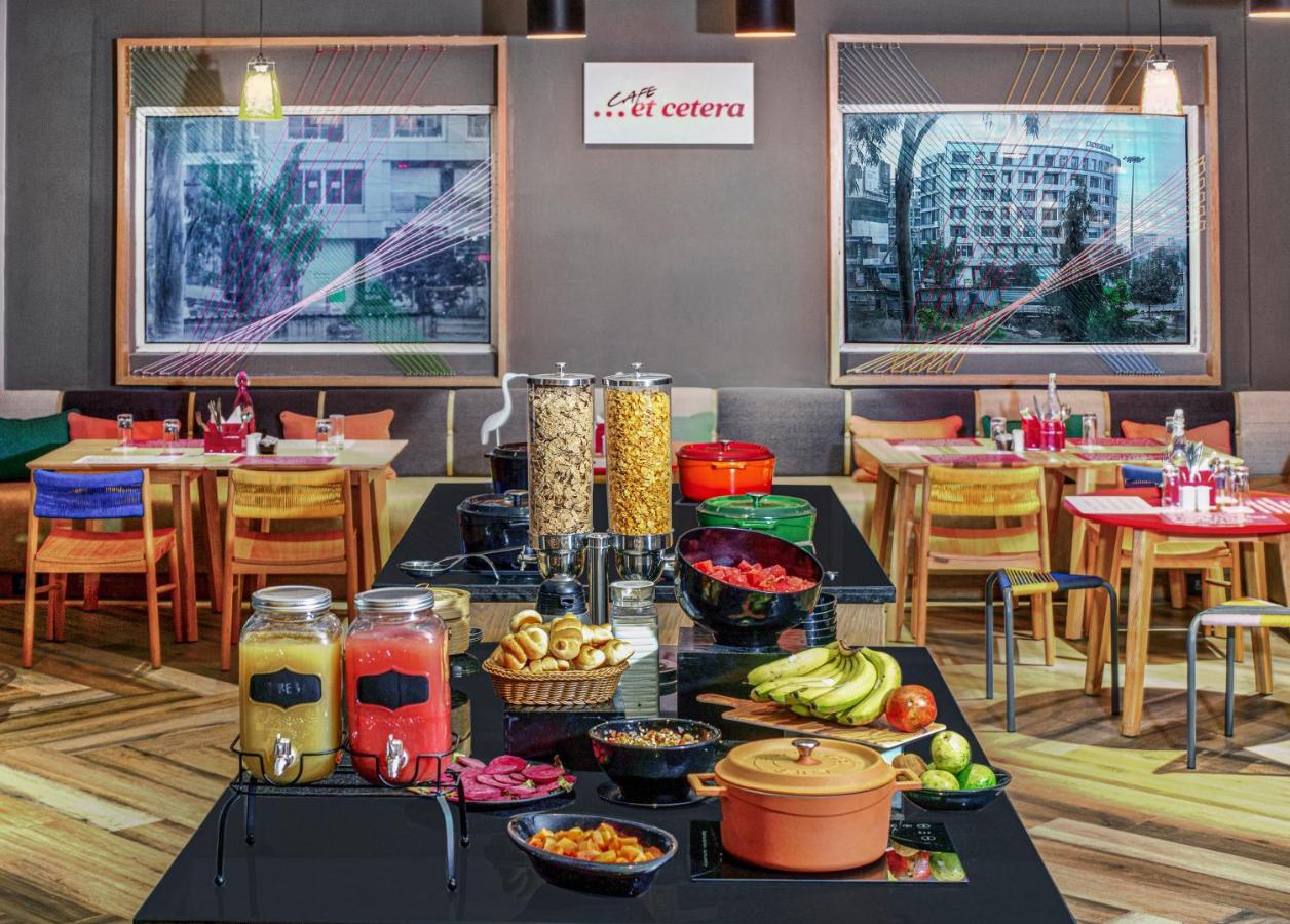 Ginger Sanand Hotel Bagian luar foto
